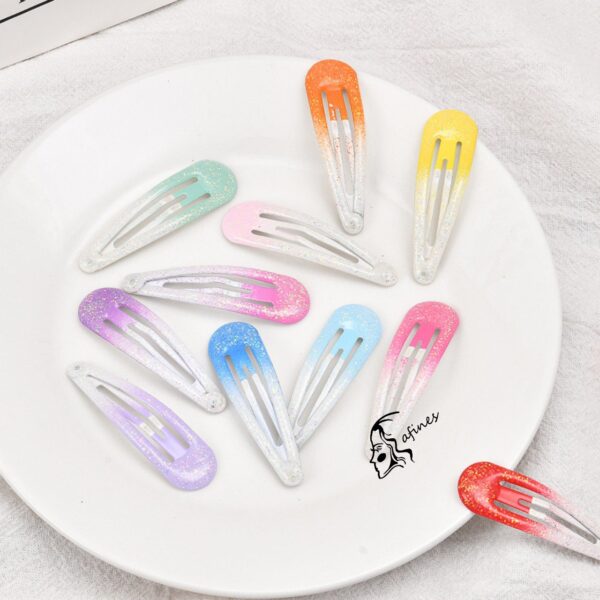 HEBILLAS  C/GLITTER EN BLISTER(4 PCS) AF050